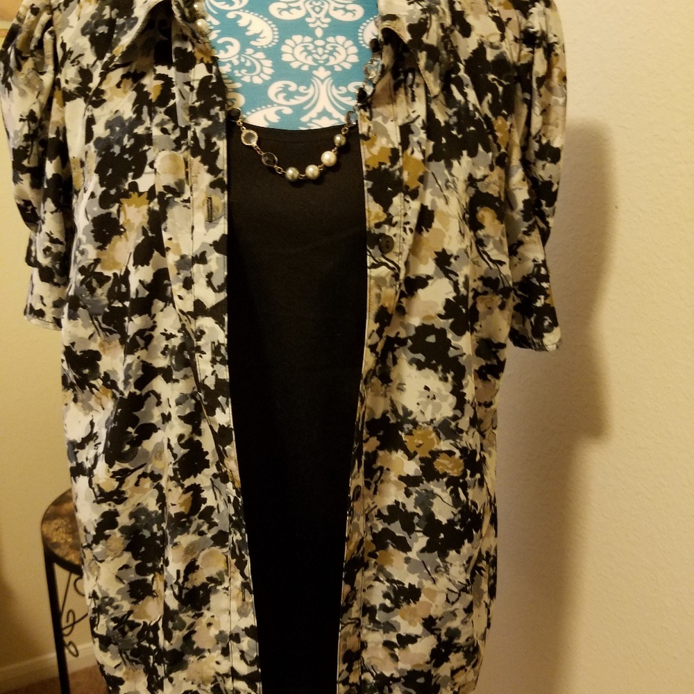 1x tan and black career blouse.